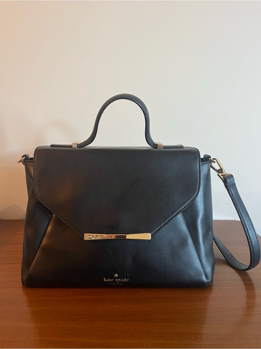 kate spade black leather flap satchel with gold hardware